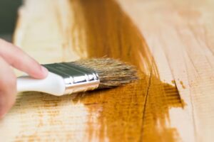 staining over paint
