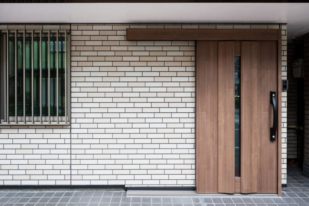 Bricks house With Wooden Sliding Door