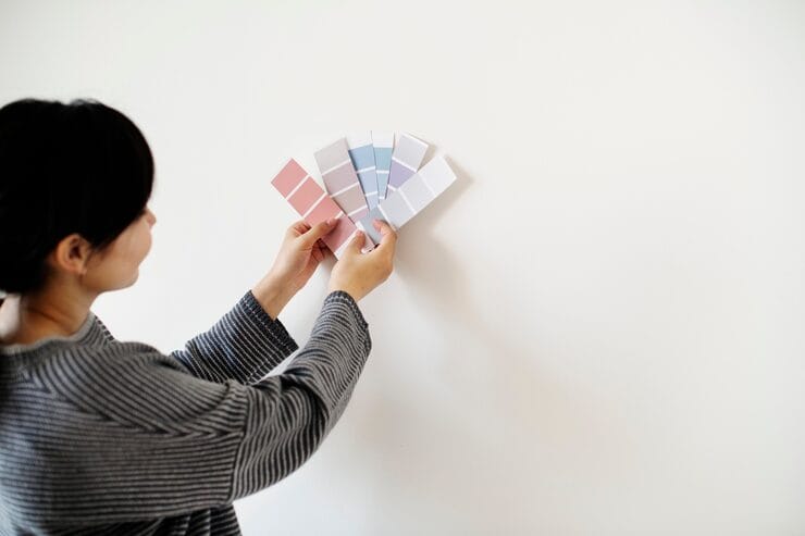 woman holding color palette