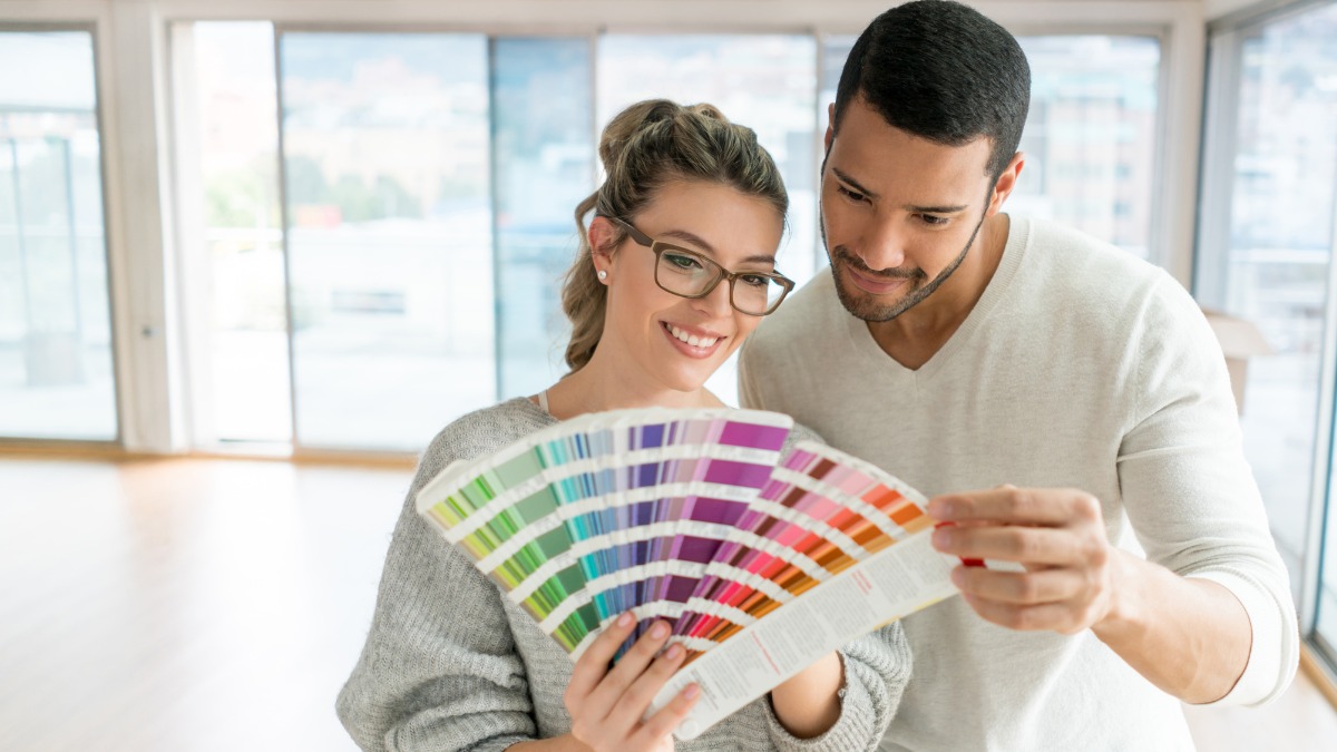 looking at a colorful paint swatch deck